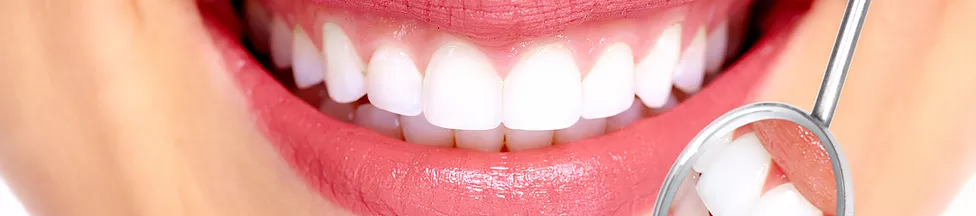 Bright white teeth seen close up.