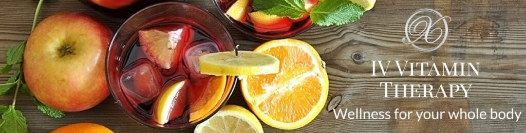Fruit next to a glass of ice and juice with text "IV vitamin therapy wellness for your whole body."